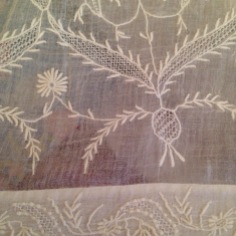 Detail of white work on Regency round gown